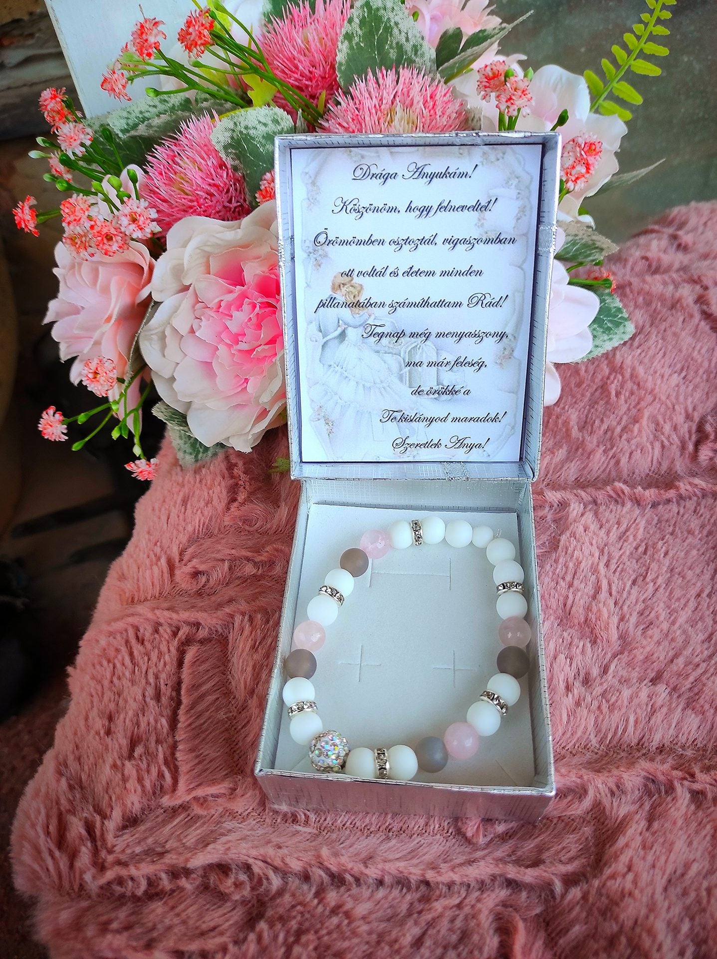 Ajándék védelmező szülőkösztöntő karkötő